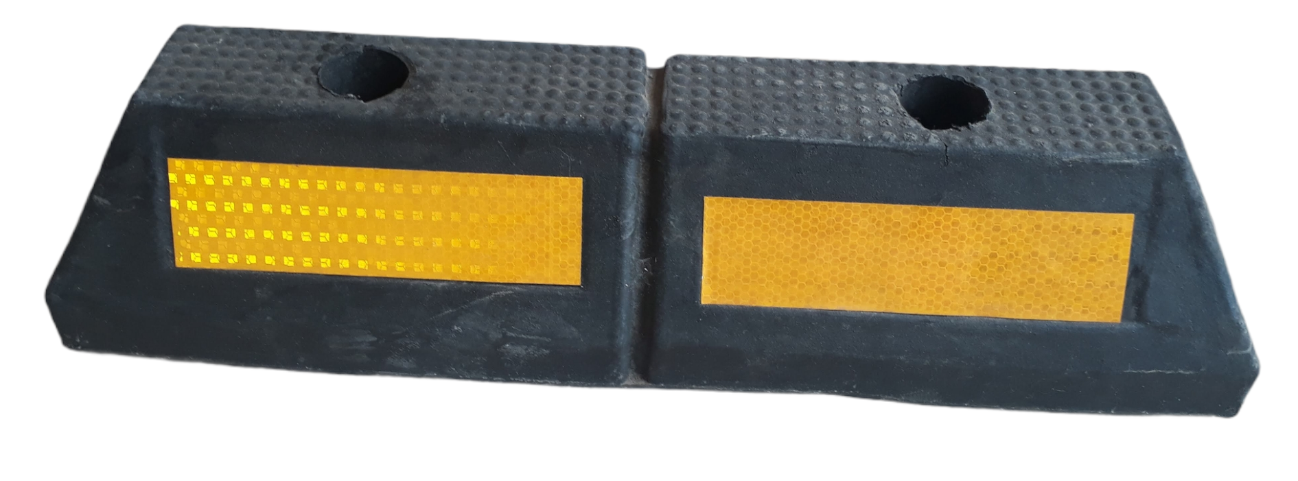 Pyramidal wheel stopper to halt front and rear vehicle wheels when parking in garages.Size:55 x 15 x 12 cm